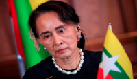 Myanmar's Aung San SuuKyi appears via vi...