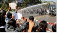 Myanmar police fired rubber bullets to d...