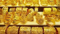 Gold price rises slightly