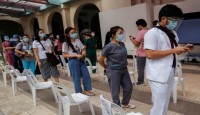 Philippines extends partial coronavirus...